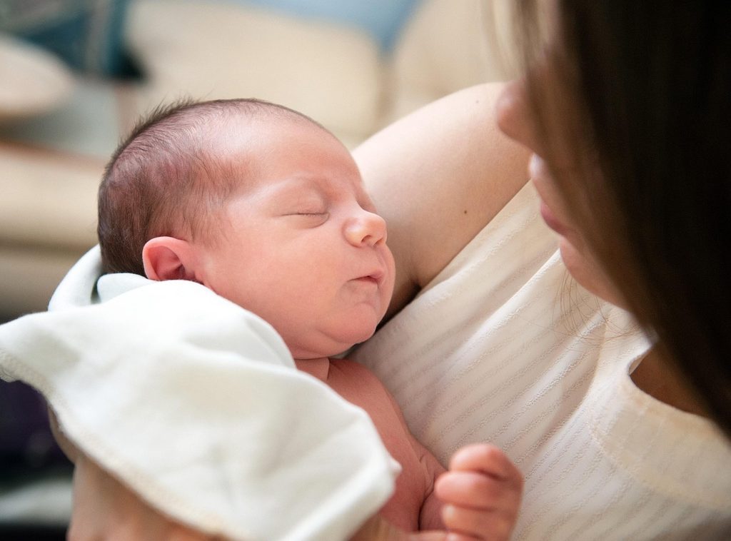 baby-sleeping-mother-lap